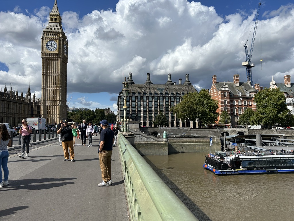 Portcullis House on the right of the Elizabeth Tower a.k.a. Big Ben
